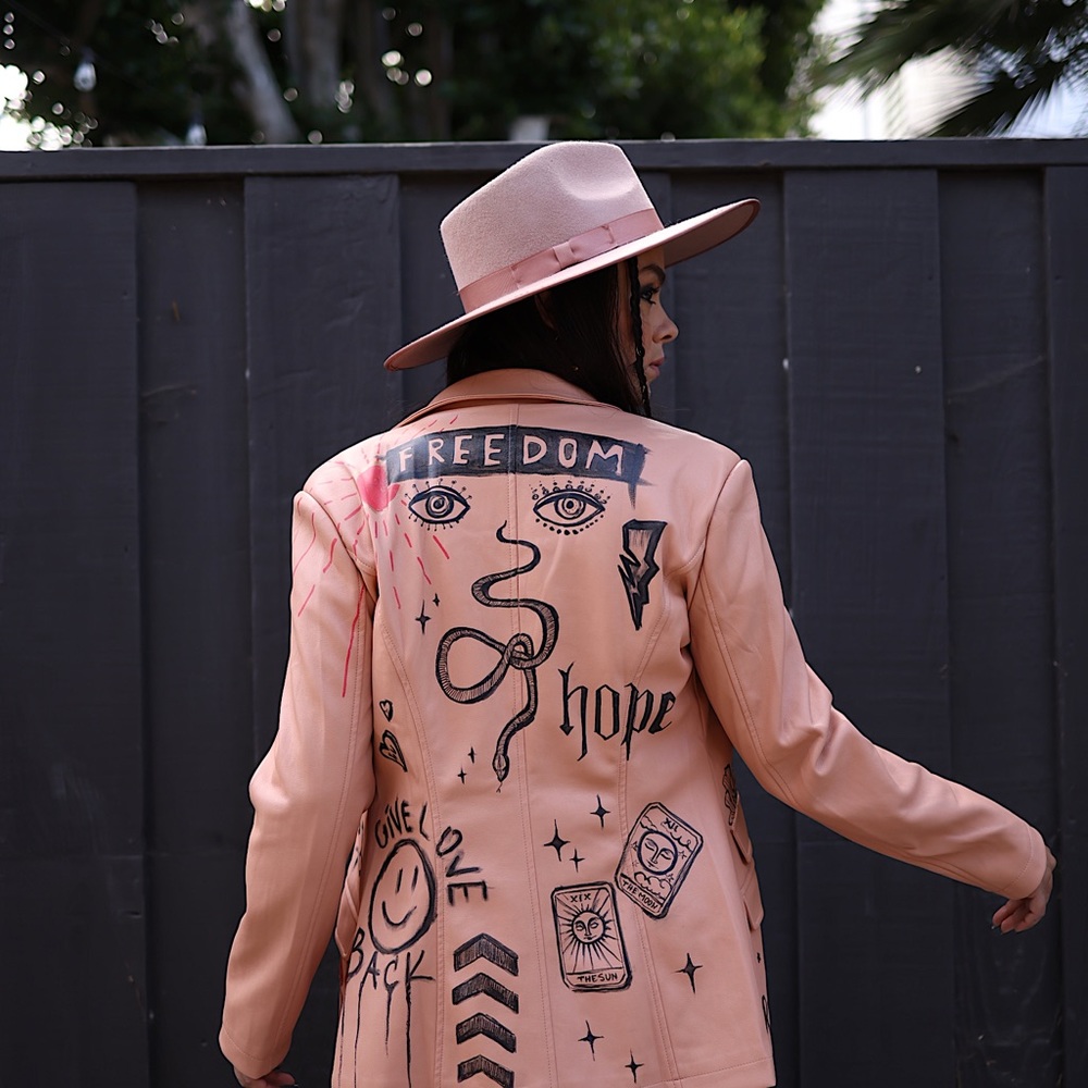 Customized vegan leather jacket with unique one if a kind design.
